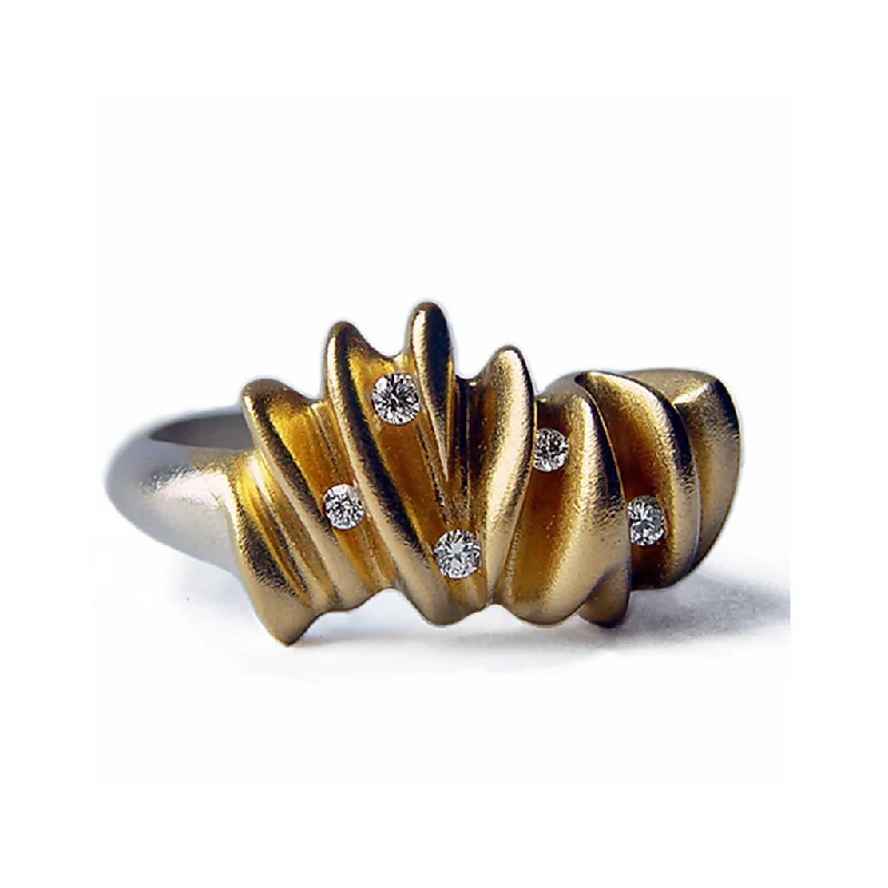 5 diamond sculptural silver shell ring with contrasting 22ct gold plating