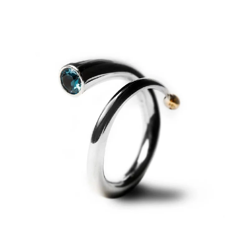 Silver spiral wiggly ring with blue topaz & 18K gold detail